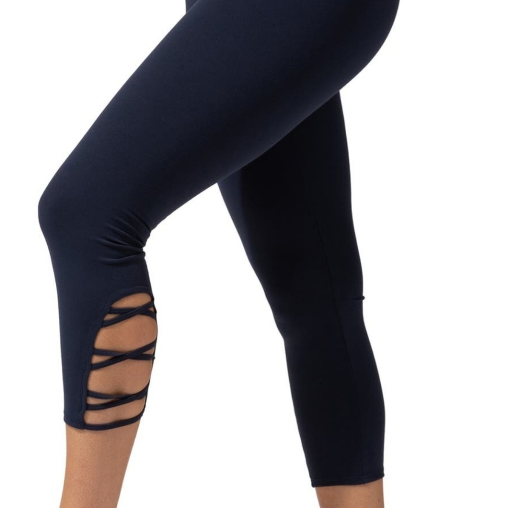 Cropped leggings crisscross style. Brand new with tags